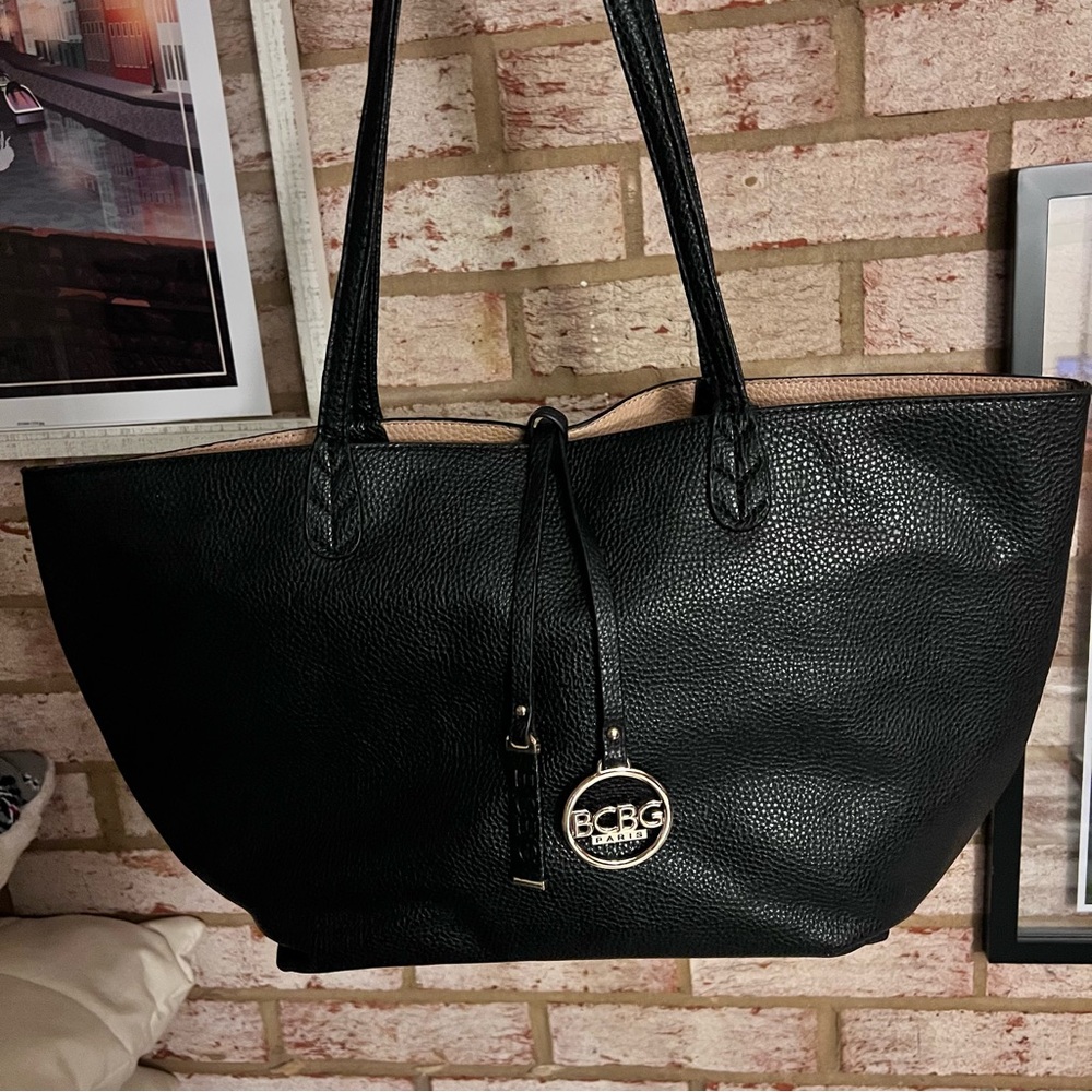 BCBG Paris black tote bag with gold accents